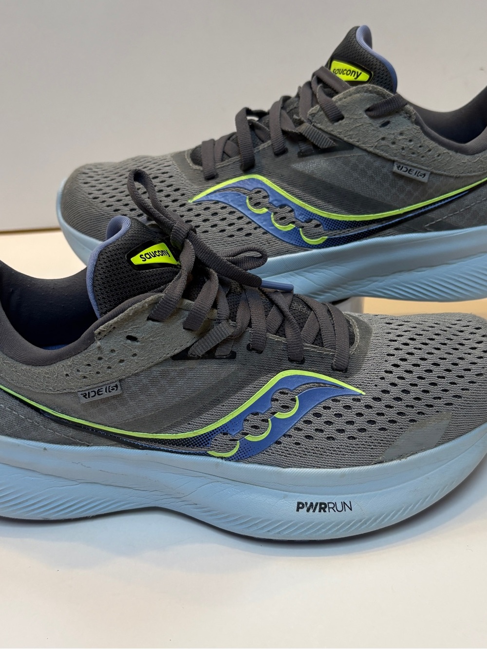 Saucony women’s Grey Running Shoes with Blue & Neon Accents